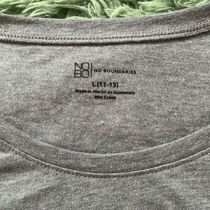 grey tight fitting shirt